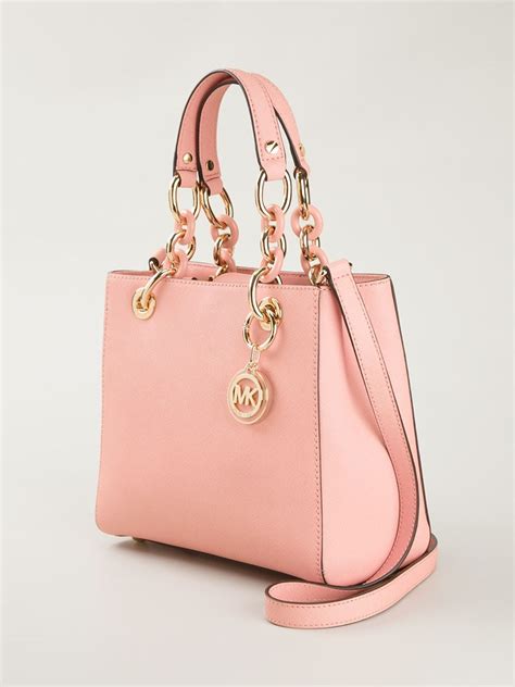 mini michael kors pink purse|Michael Kors small brown purse.